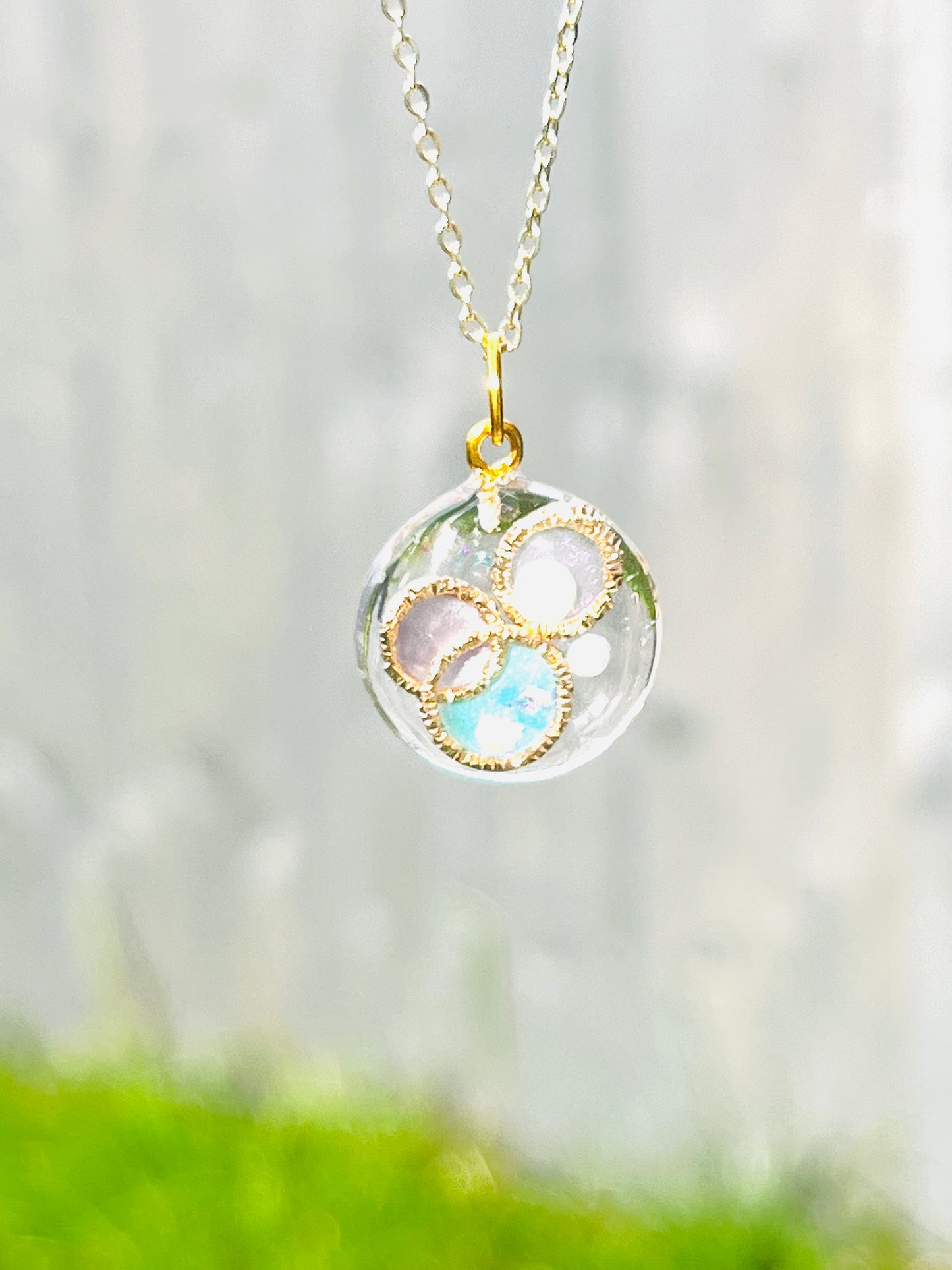 Golden ring and heart in round necklaces