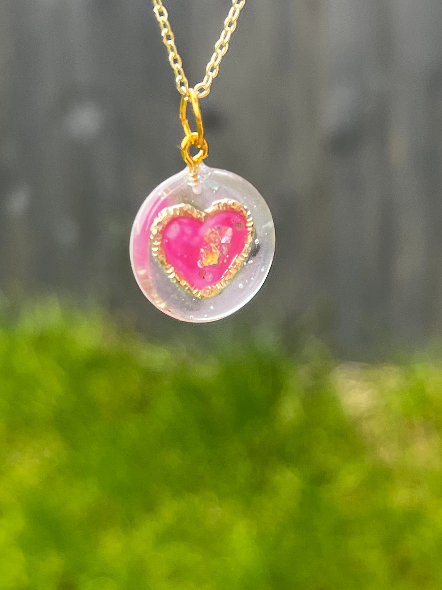 Golden ring and heart in round necklaces