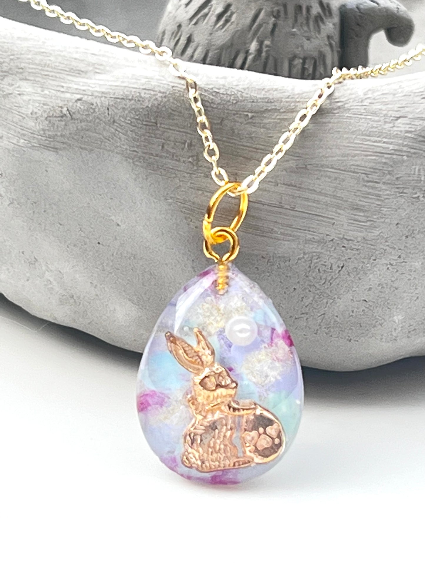 Golden rabbit with pearl necklace