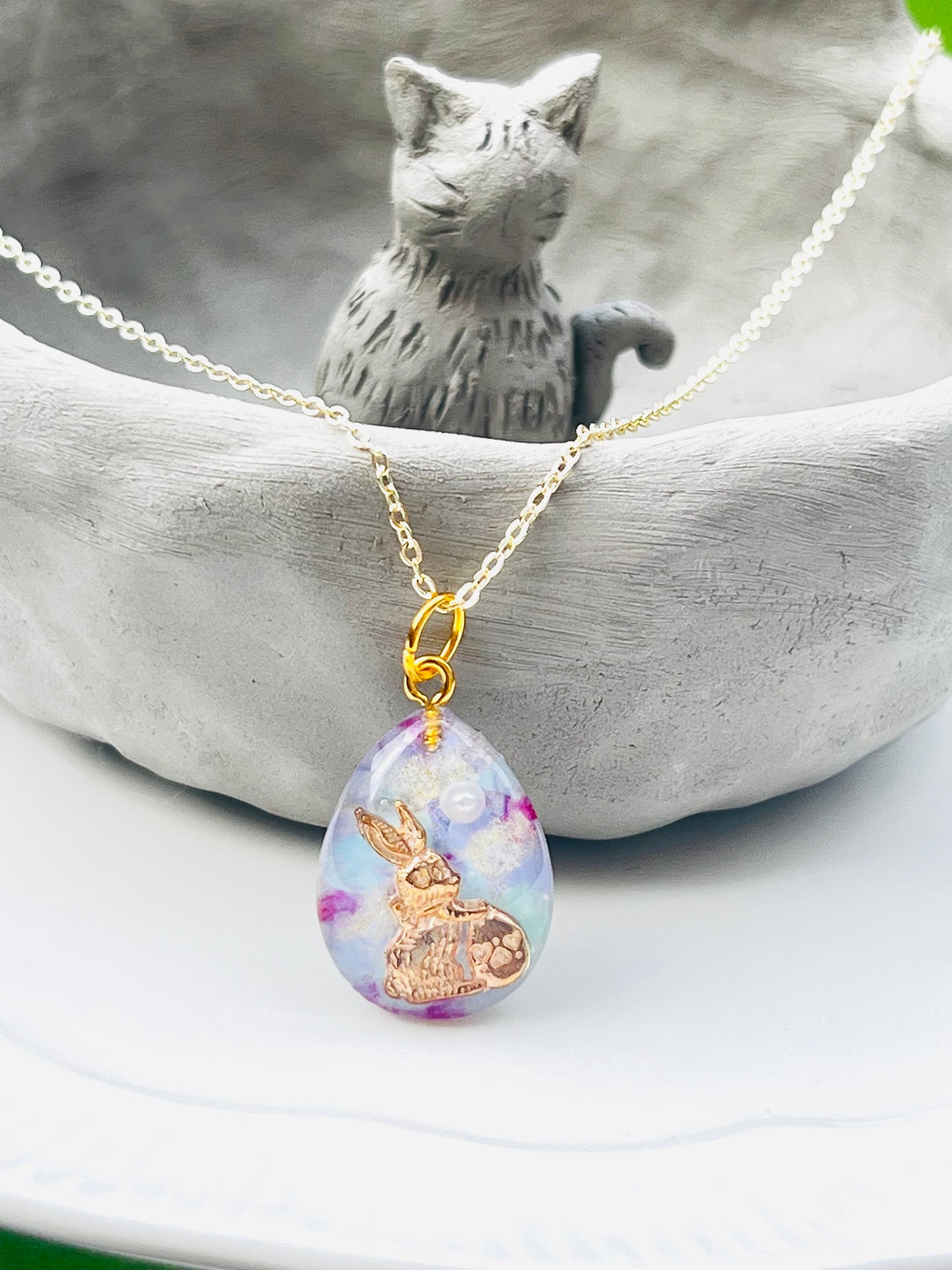 Golden rabbit with pearl necklace