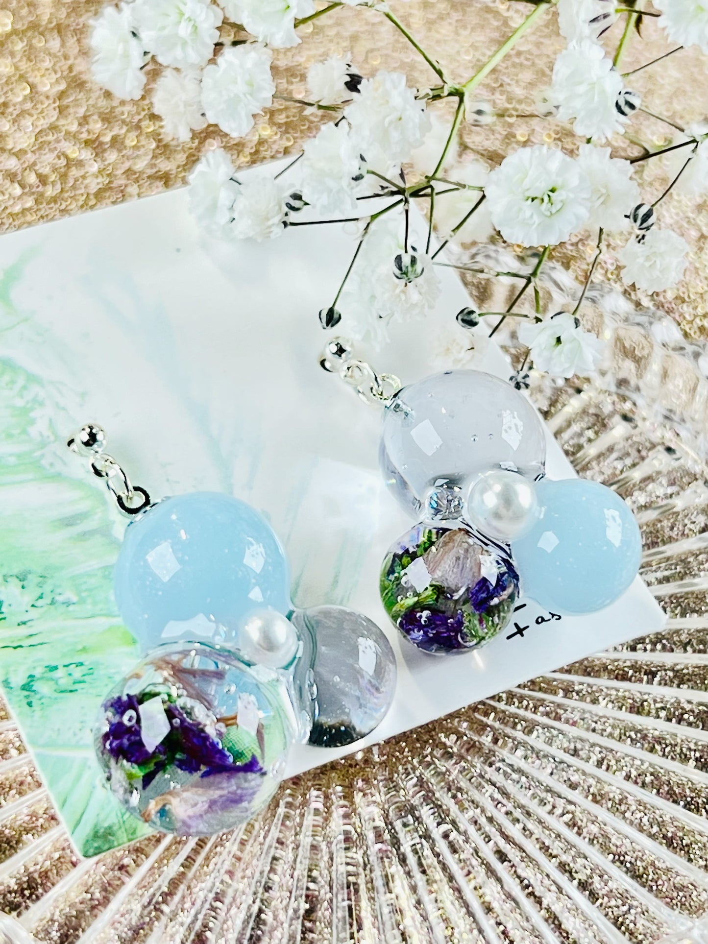 Sphere and flower earrings