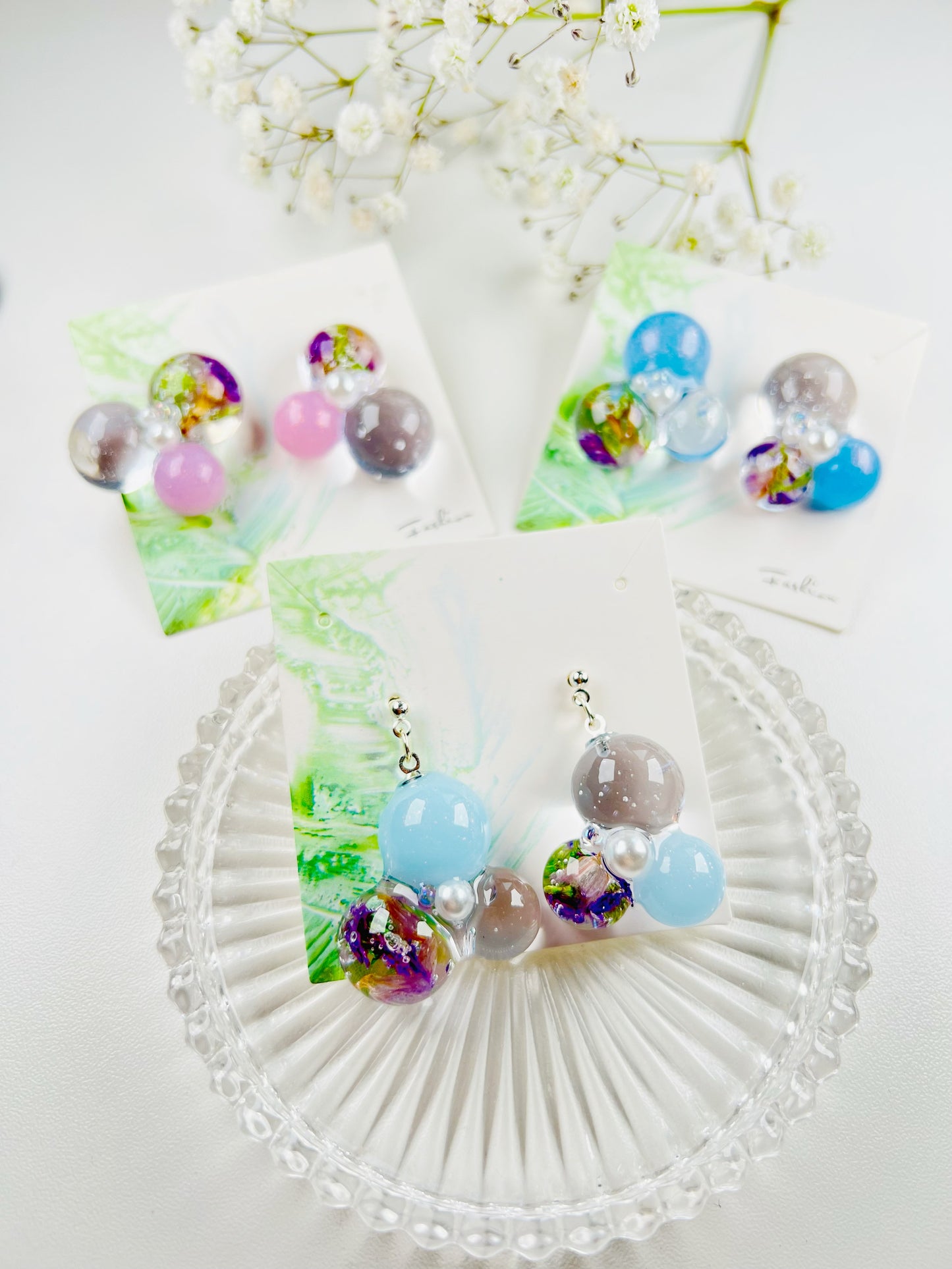 Sphere and flower earrings