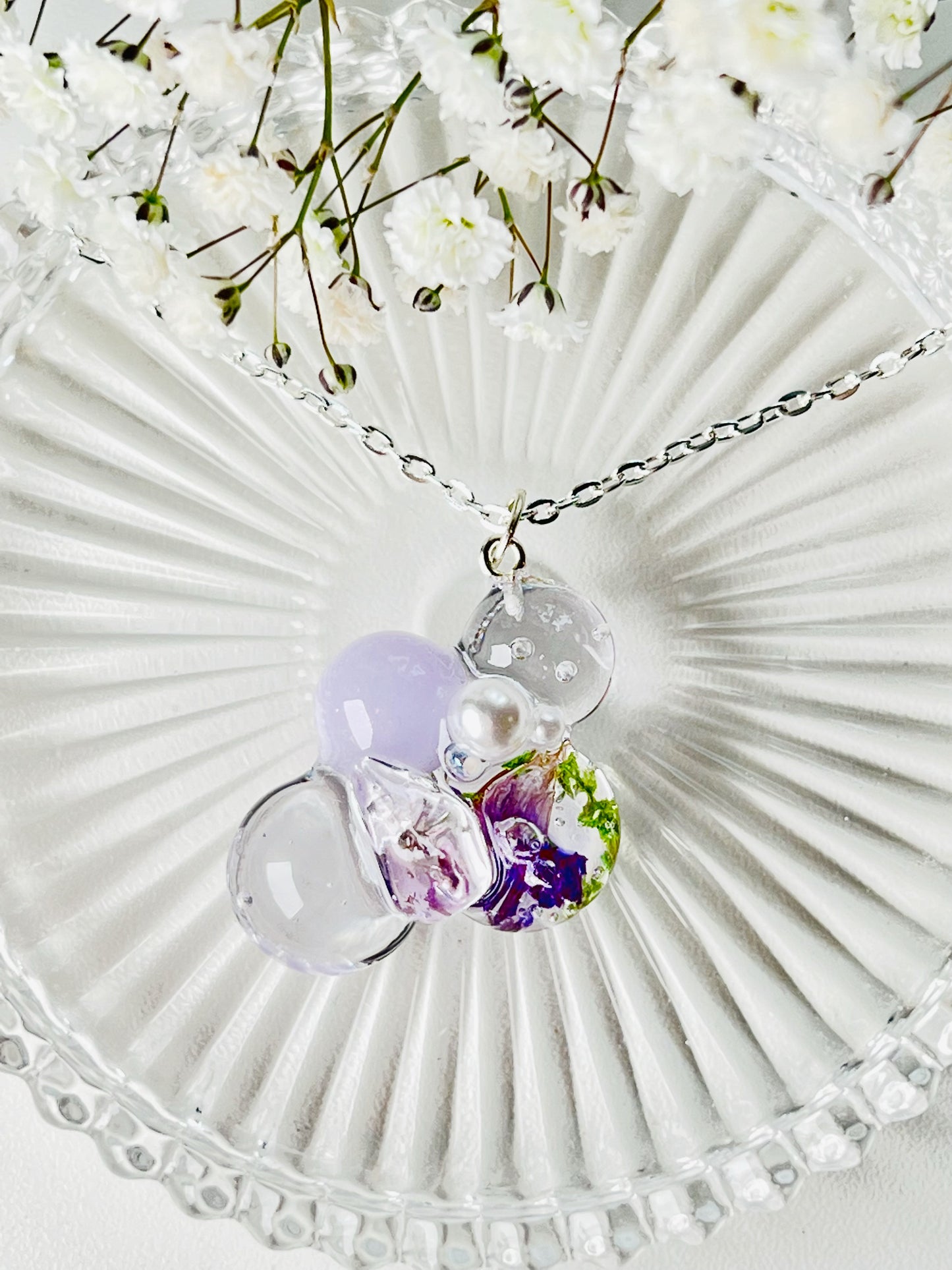 Sphere and flower necklaces