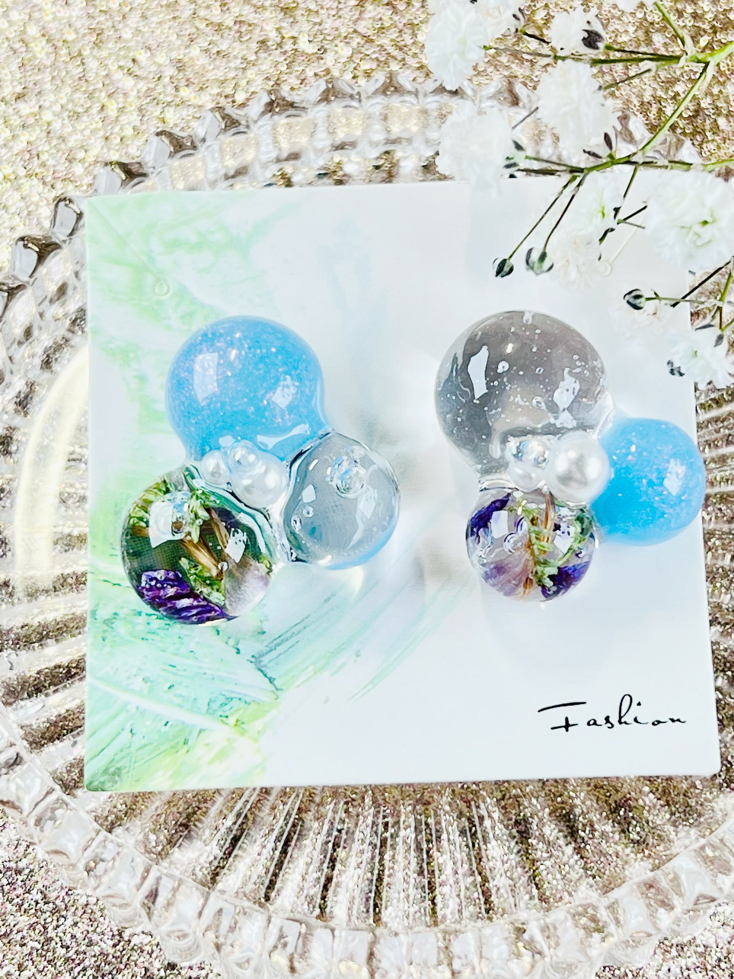 Sphere and flower earrings