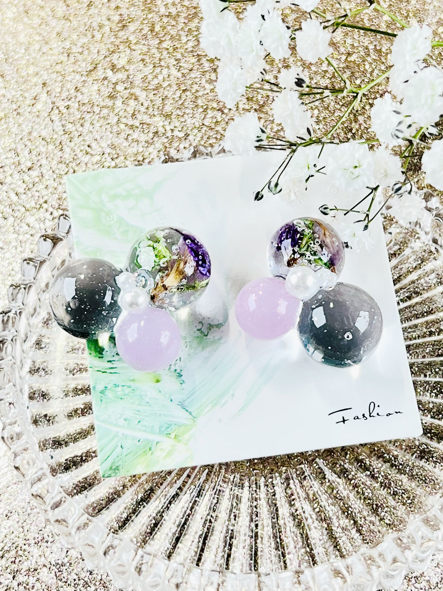 Sphere and flower earrings