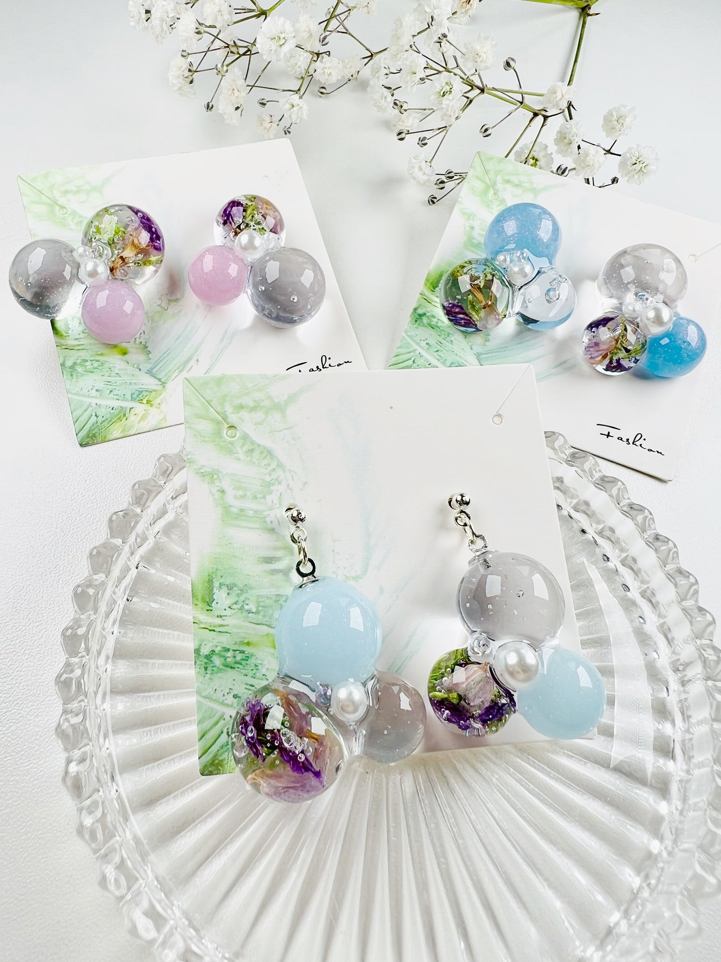 Sphere and flower earrings