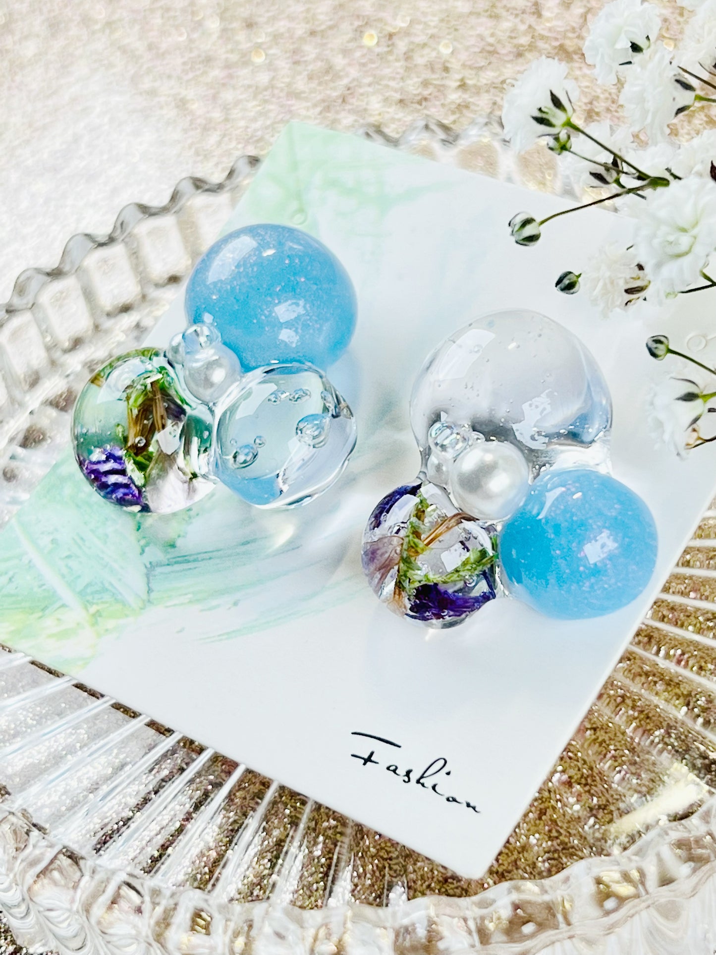 Sphere and flower earrings