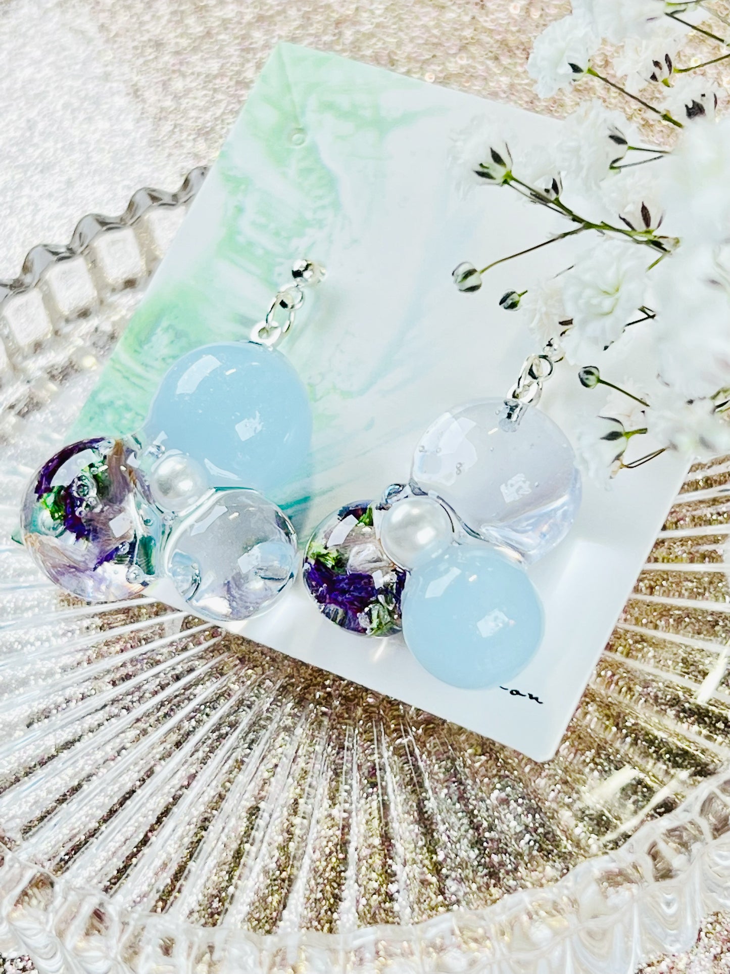 Sphere and flower earrings