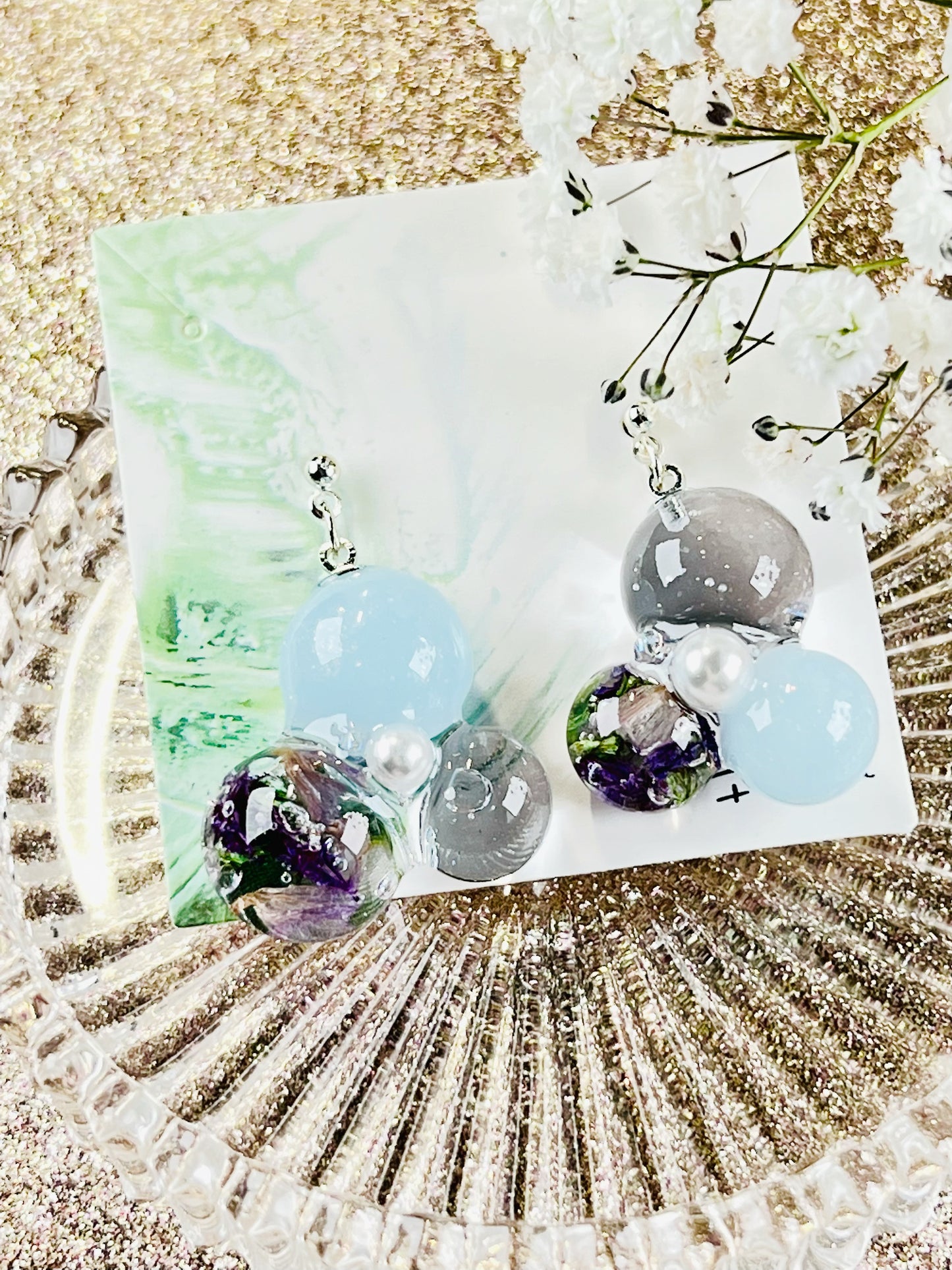 Sphere and flower earrings