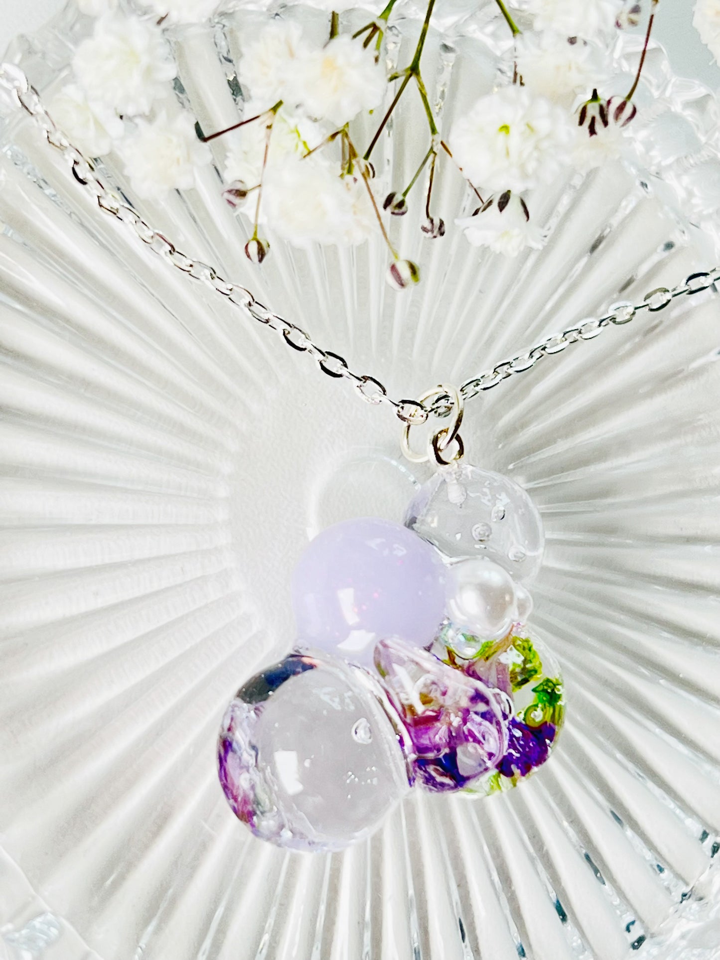 Sphere and flower necklaces