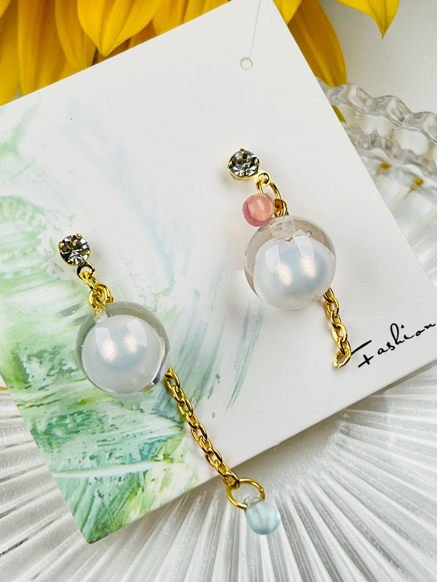 White pearl earrings