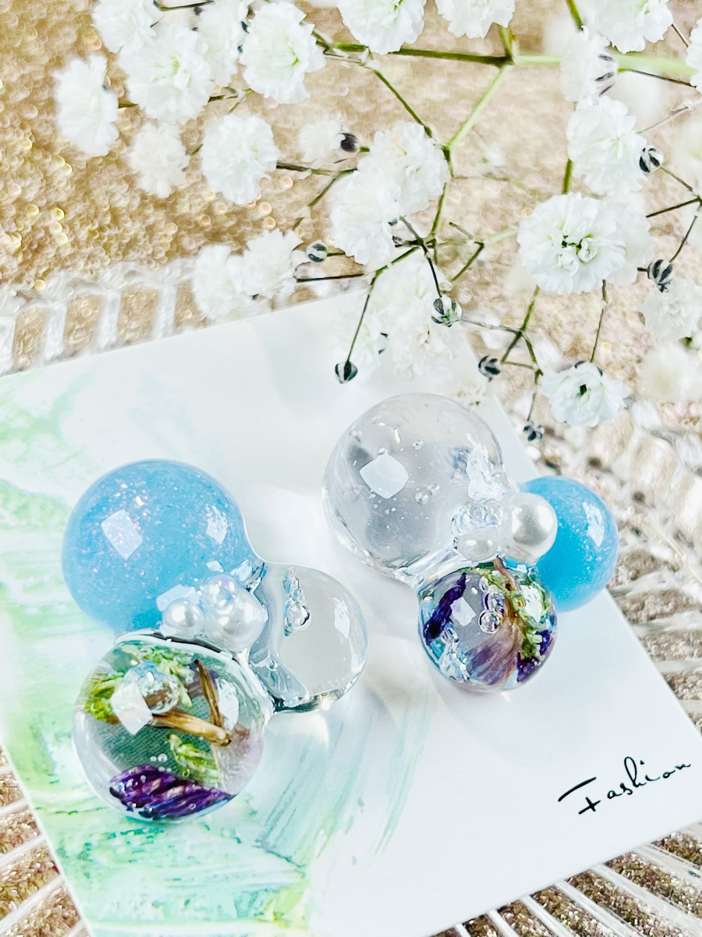 Sphere and flower earrings