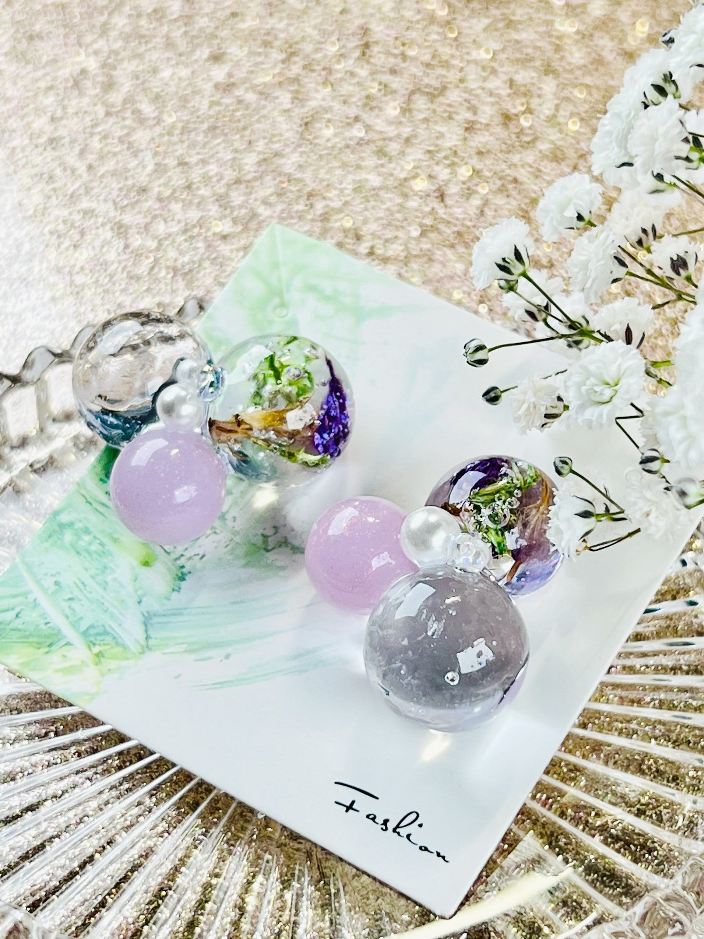 Sphere and flower earrings