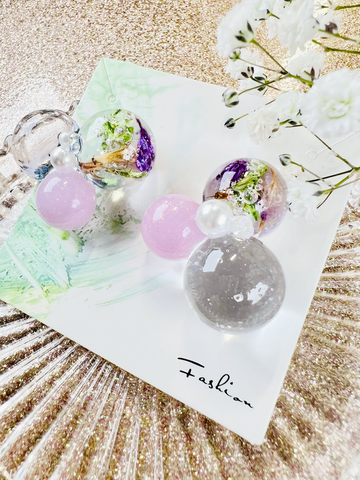 Sphere and flower earrings