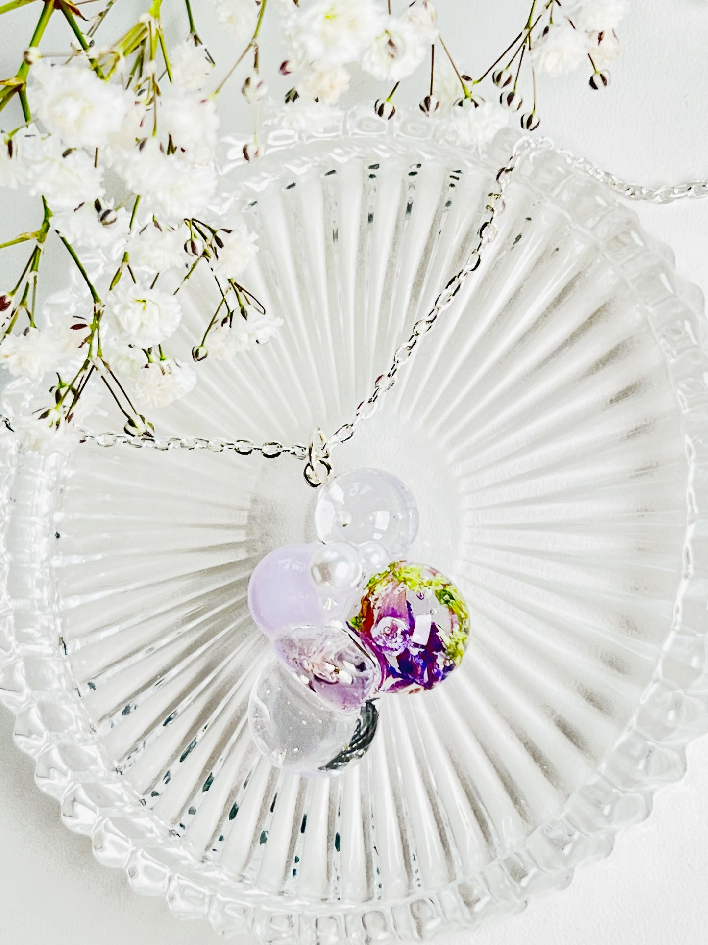 Sphere and flower necklaces